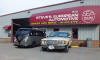 Short Bus in front of Steve's European Auto...